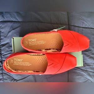 Toms - red canvas slip on shoes
